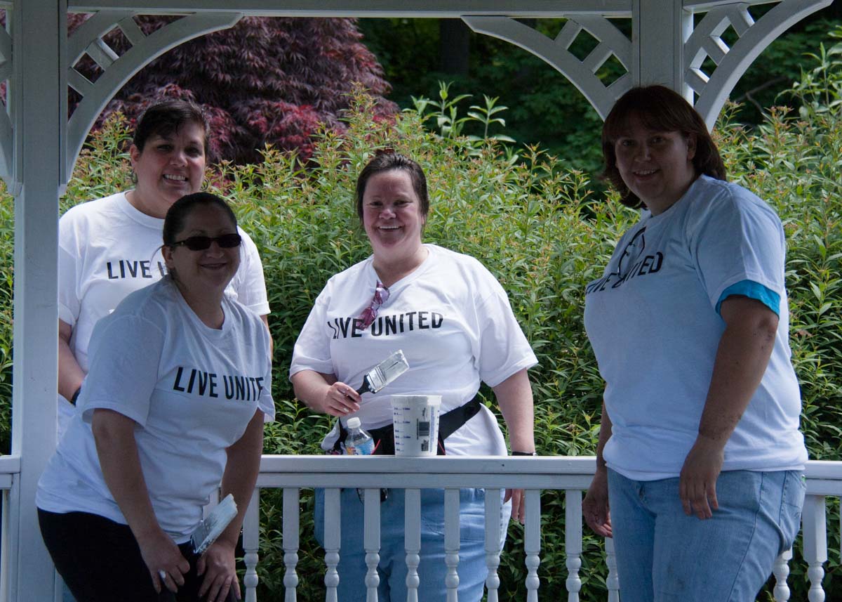 Volunteering at Tarrywile Park United Way Day of Caring with employees from Praxair