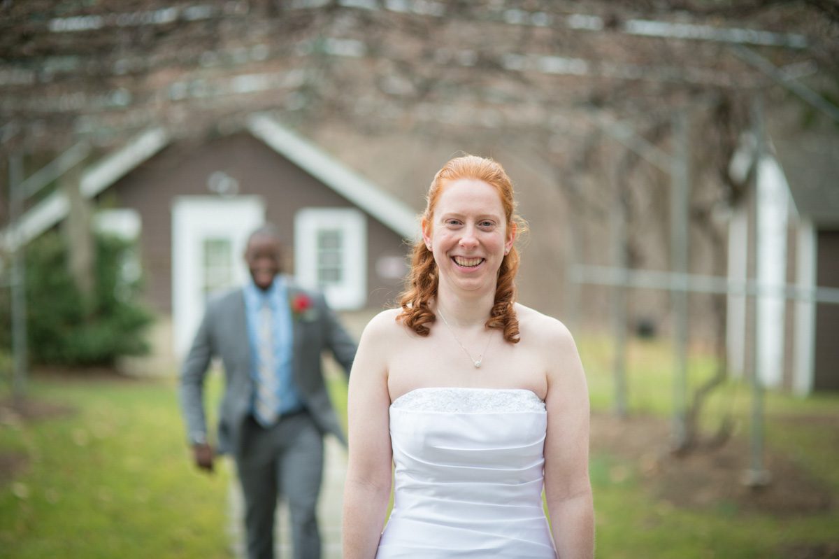 A December Wedding brandon sneaking up on catherine under the grape arbor